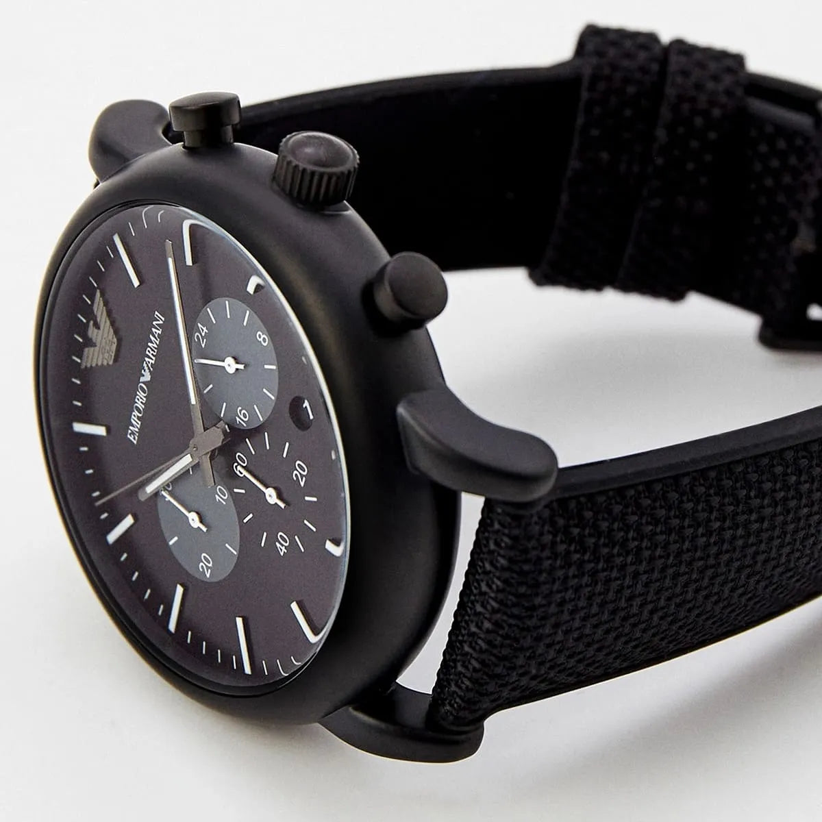 Side view of Emporio Armani Luigi AR11450 chronograph watch with black case and fabric strap