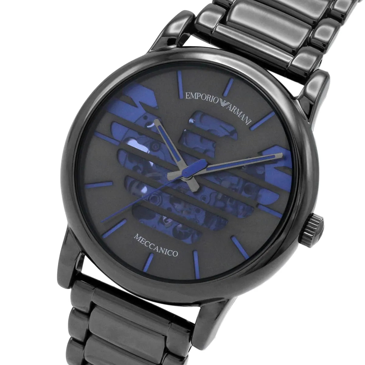 Angled view of Emporio Armani Meccanico watch dial with blue hands and mechanical details