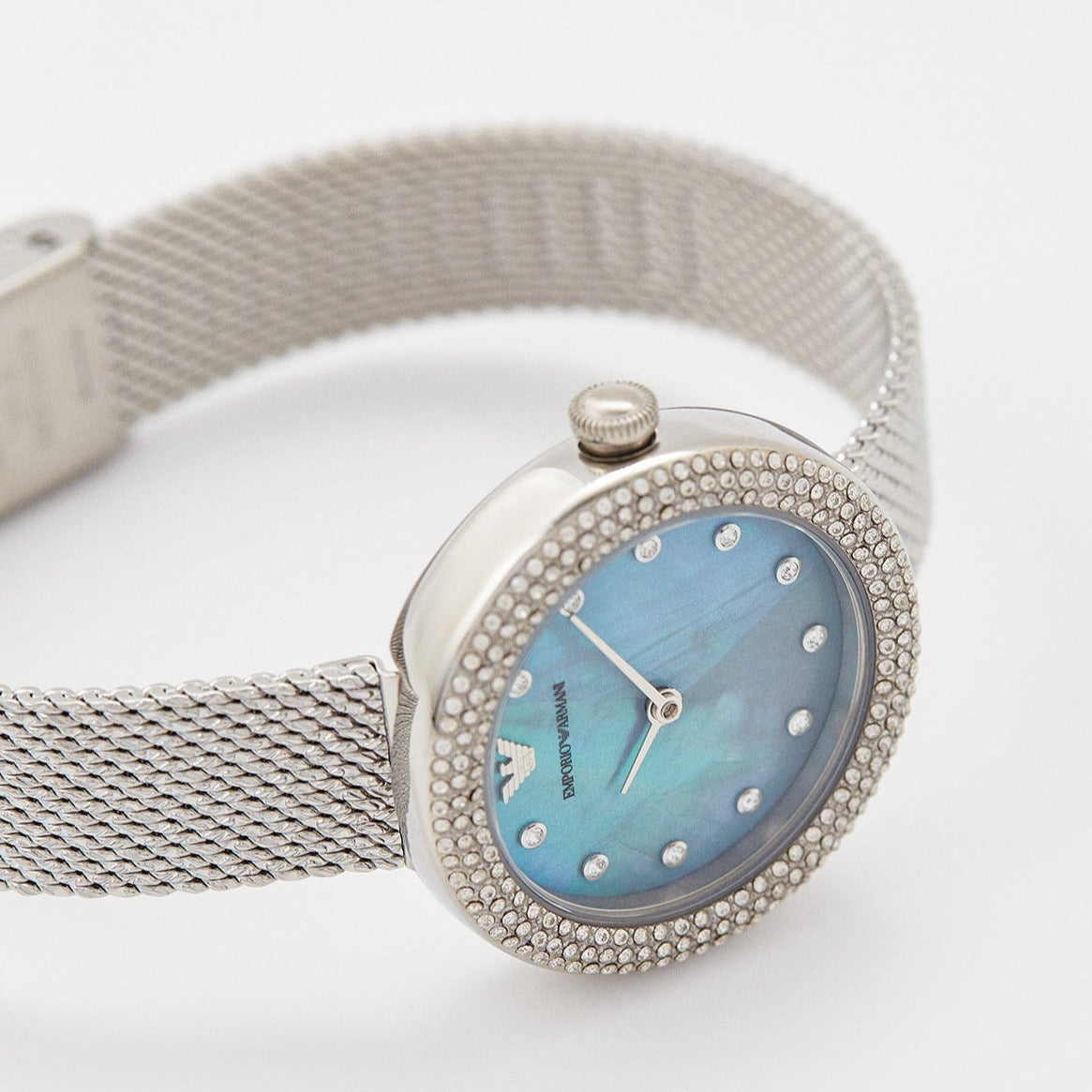 Emporio Armani Rosa watch on wrist displaying blue mother-of-pearl dial and diamond bezel