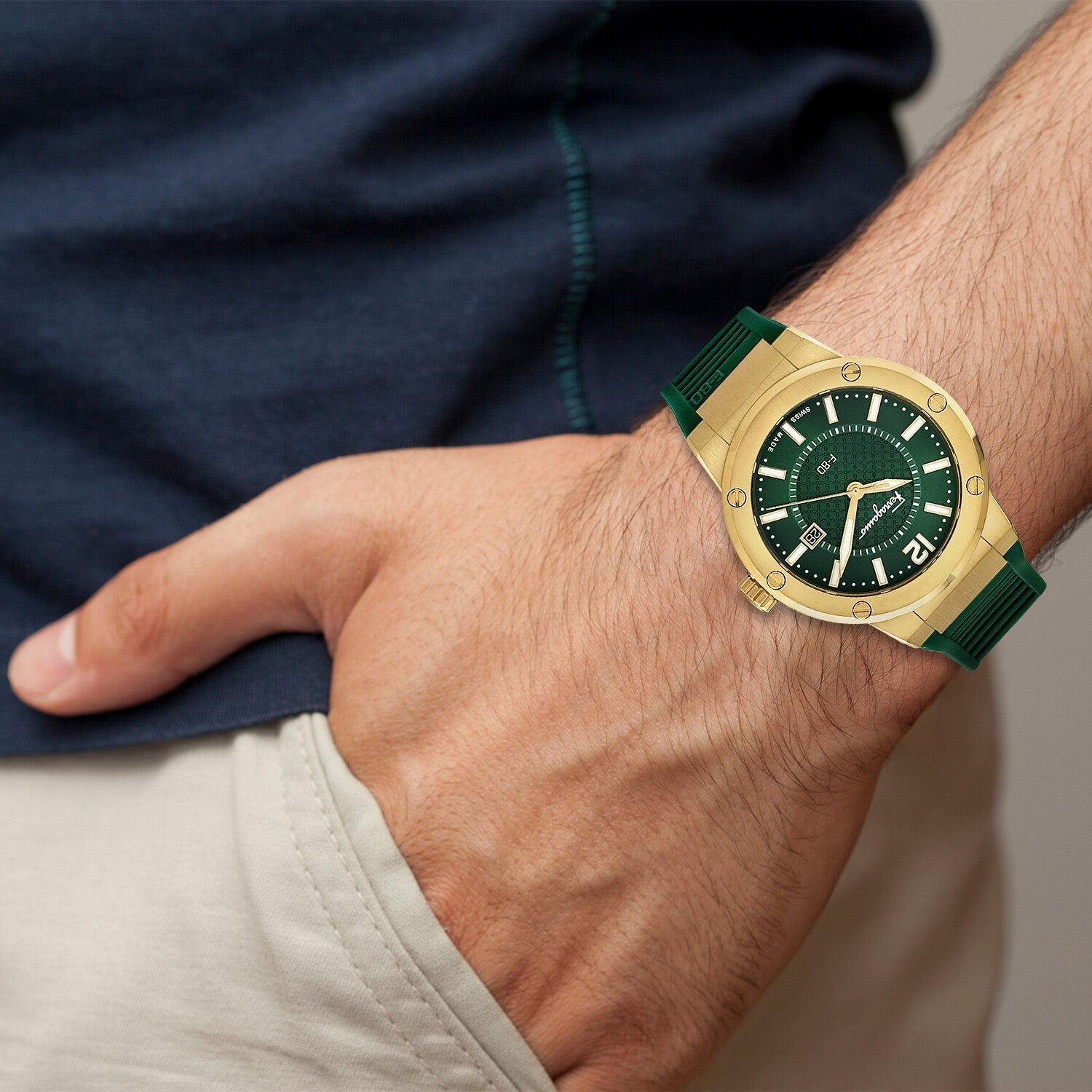 Ferragamo F-80 quartz watch on wrist with green dial and strap