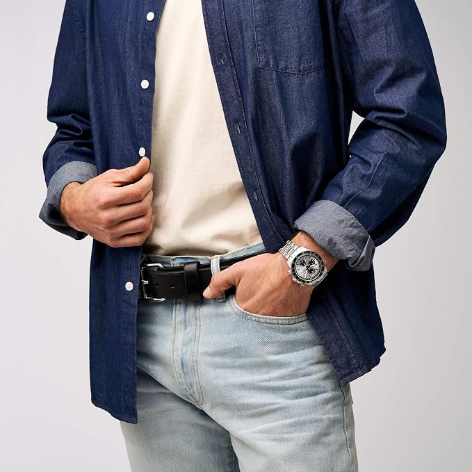 Fossil Autocross chronograph watch worn on wrist with white dial and stainless steel band