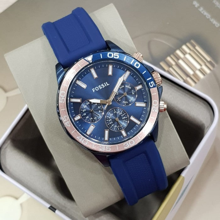 Fossil Bannon BQ2498 watch on wrist with blue dial and rose gold chronograph subdials