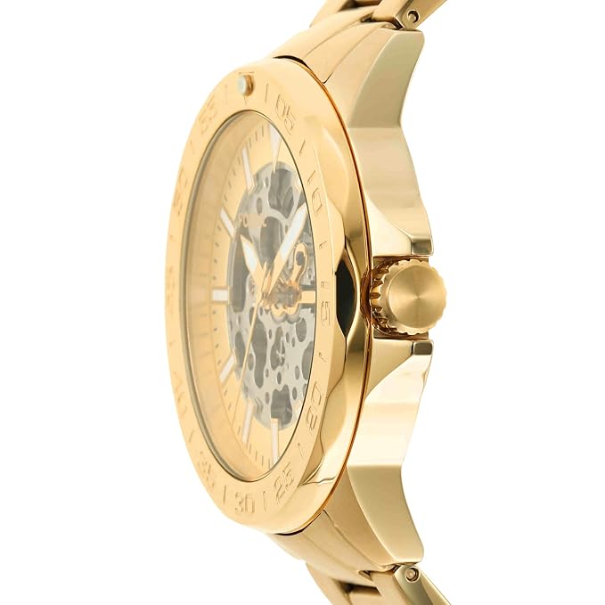 Side profile of Fossil Bannon showing gold-tone case, bezel, crown, and skeleton dial design
