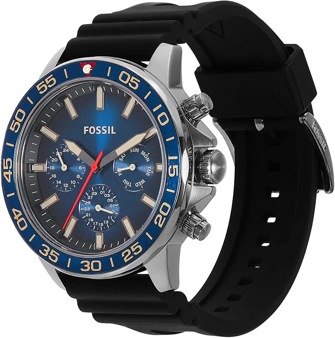 Fossil Bannon BQ2772 three-quarter view showing blue bezel, chronograph subdials, and black silicone strap