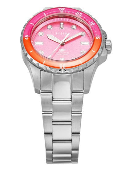 Close-up of pink dial with diamond and bar hour markers, pink and orange rotating bezel on Fossil ES5351