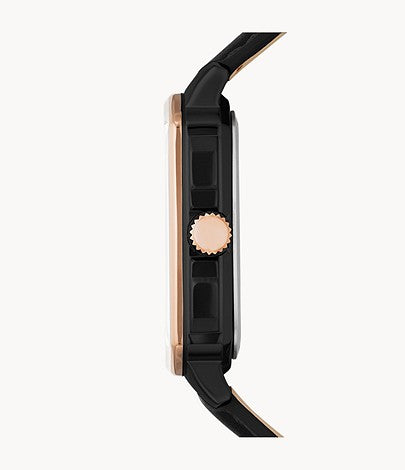 Side view of Fossil BQ2654 watch showing rose gold case and black leather strap