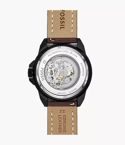 Fossil Bronson automatic watch showing skeleton movement visible through transparent caseback