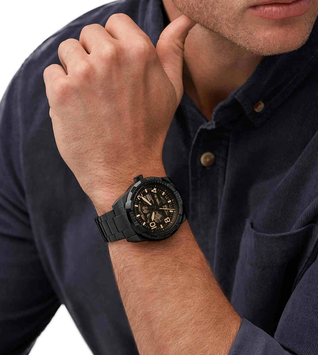 Fossil Bronson ME3256 automatic watch worn on wrist showing skeleton dial with gold accents