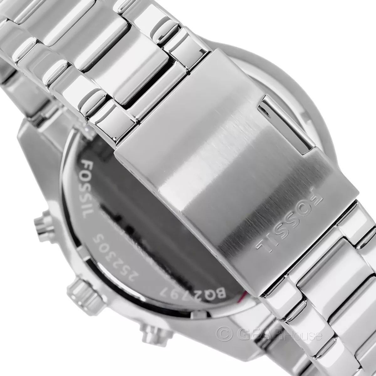 Angle view of Fossil Brox showing case side, caseback detail, and silver steel bracelet