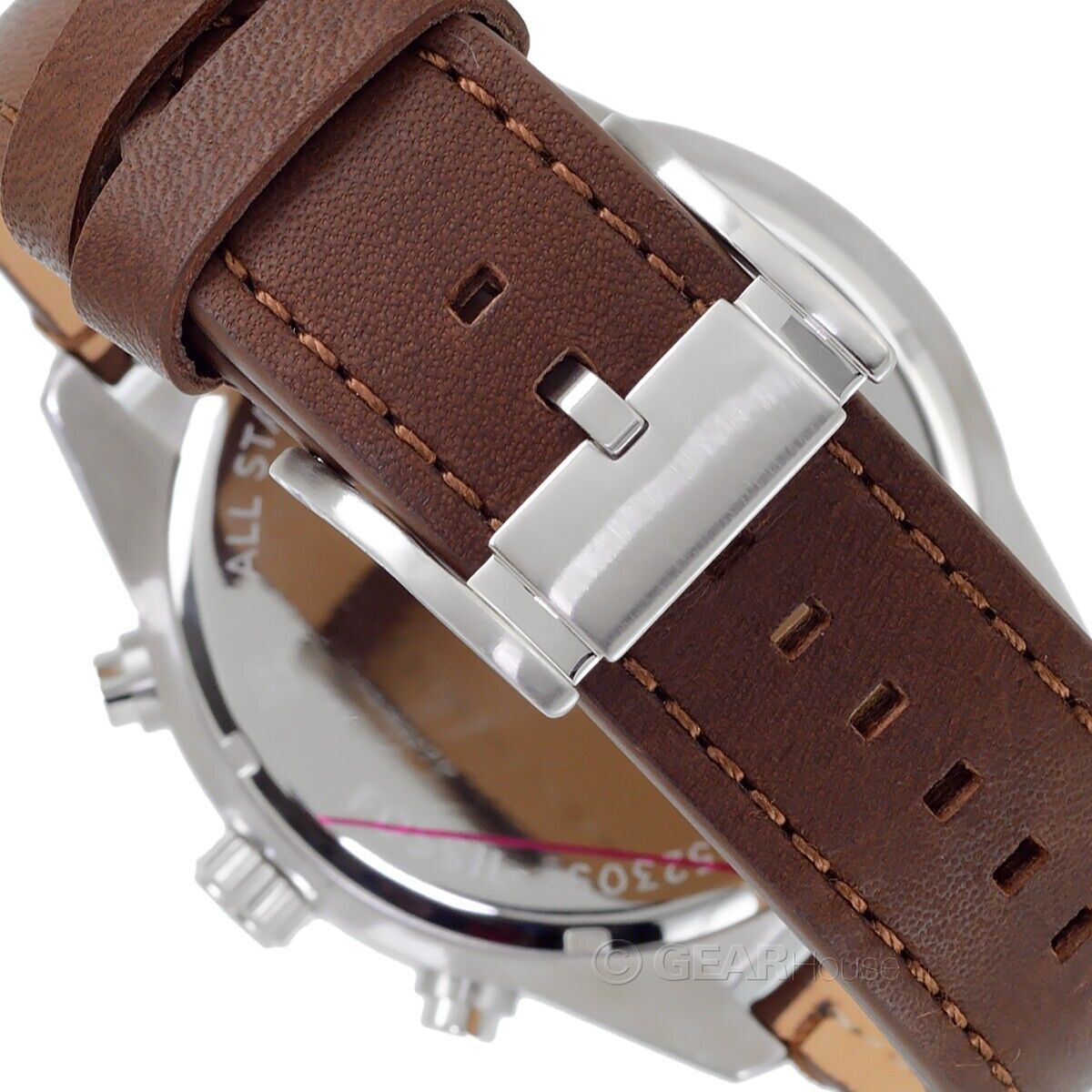 Brown leather strap with metal buckle and stitching detail on Fossil Brox watch