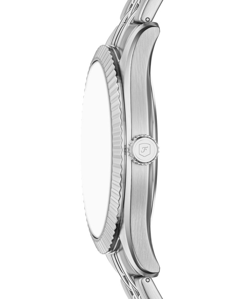 Side profile of Campbell watch showing fluted bezel and stainless steel case