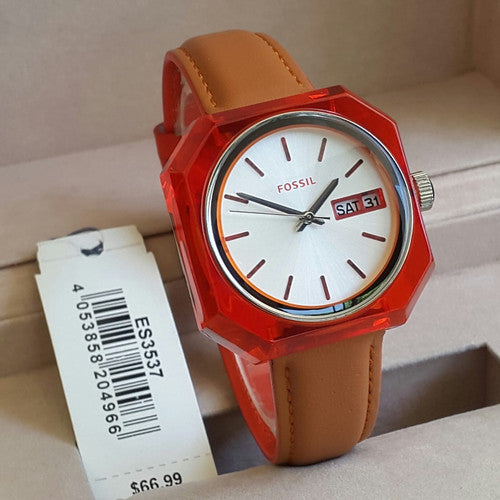 Fossil Candy ES3537 watch on wrist with orange case, cream dial, and brown leather strap