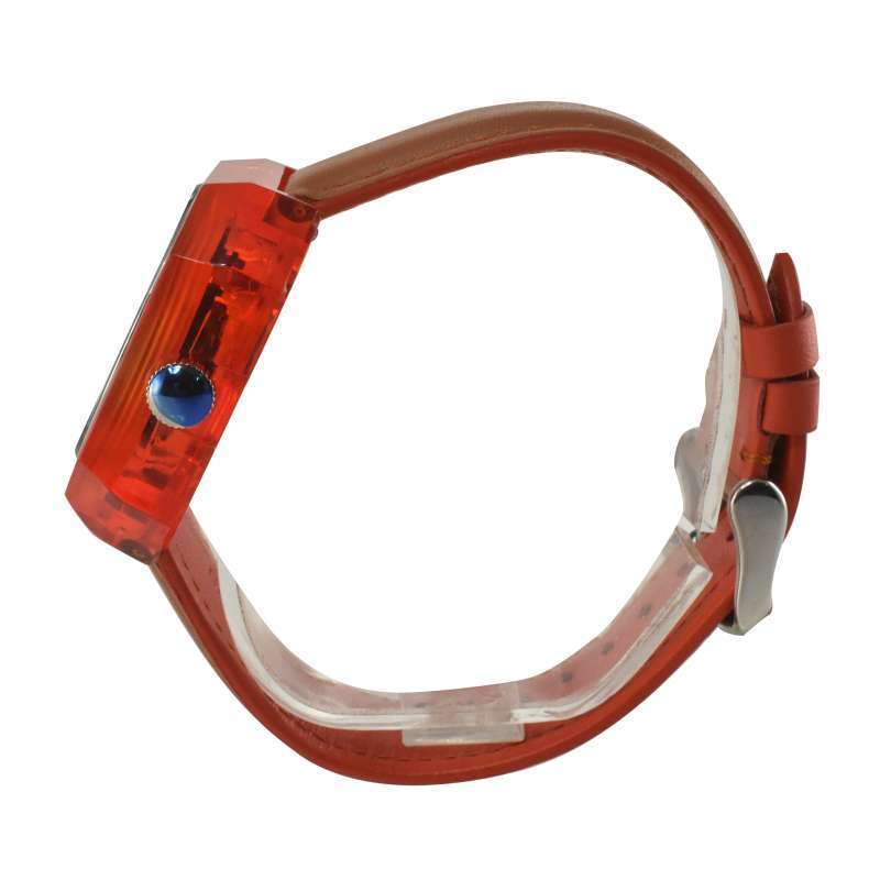 Side view of Fossil Candy ES3537 showing orange case profile and brown leather strap with buckle