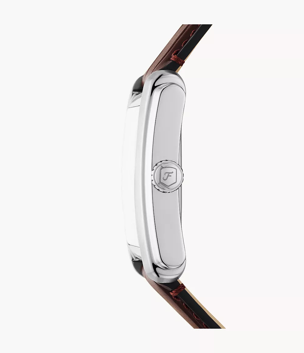 Angled view of Fossil Carraway watch displaying silver rectangular case profile and brown leather strap