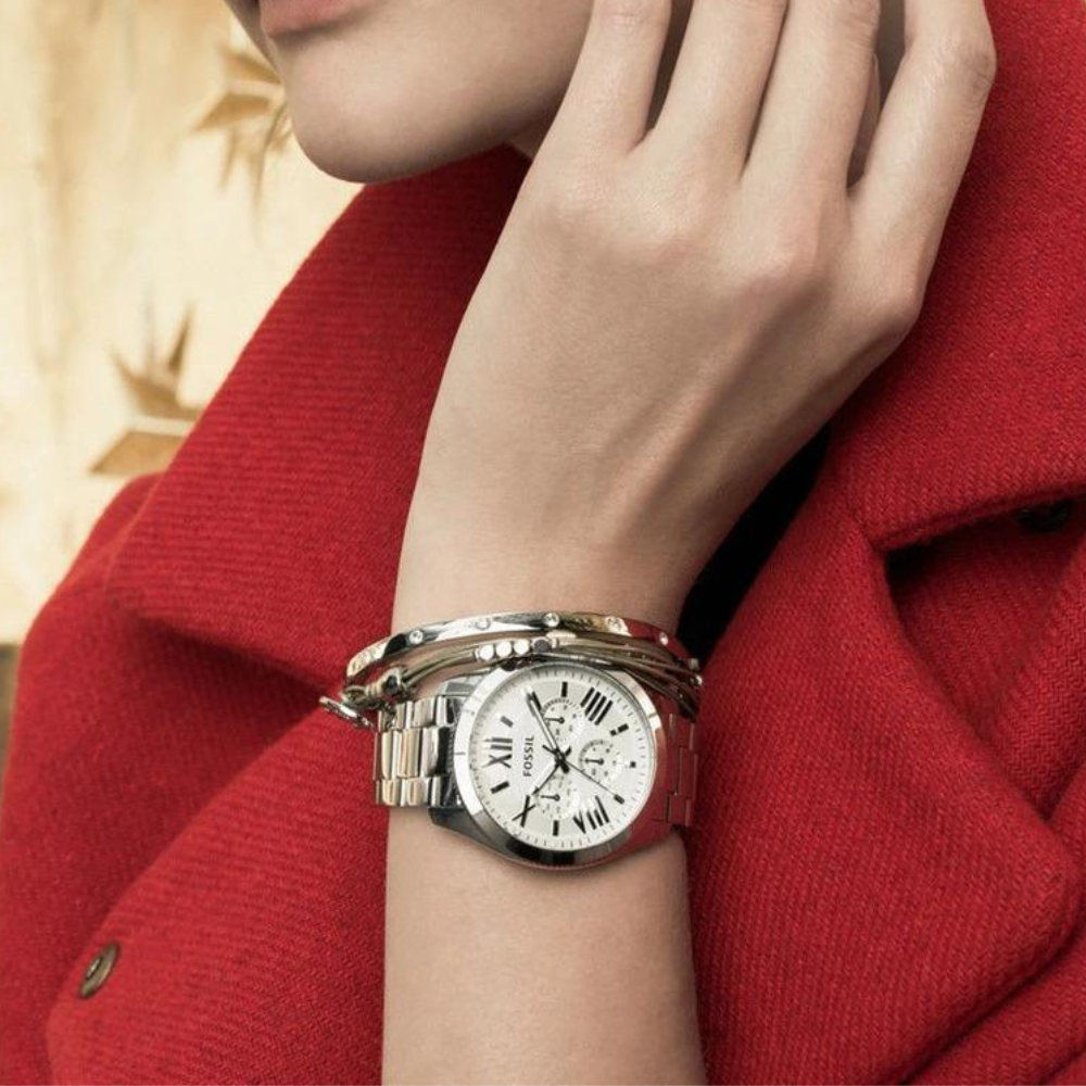 Fossil Cecile chronograph watch worn on wrist showing silver dial and metal bracelet