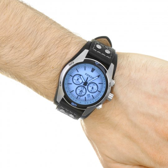 Fossil CH2564 chronograph watch worn on wrist with blue dial visible