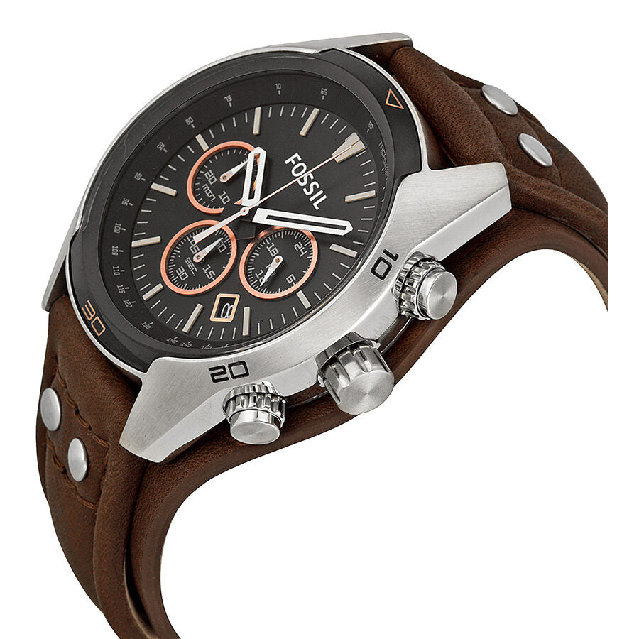 Fossil Coachman chronograph watch side angle showing silver case and brown strap