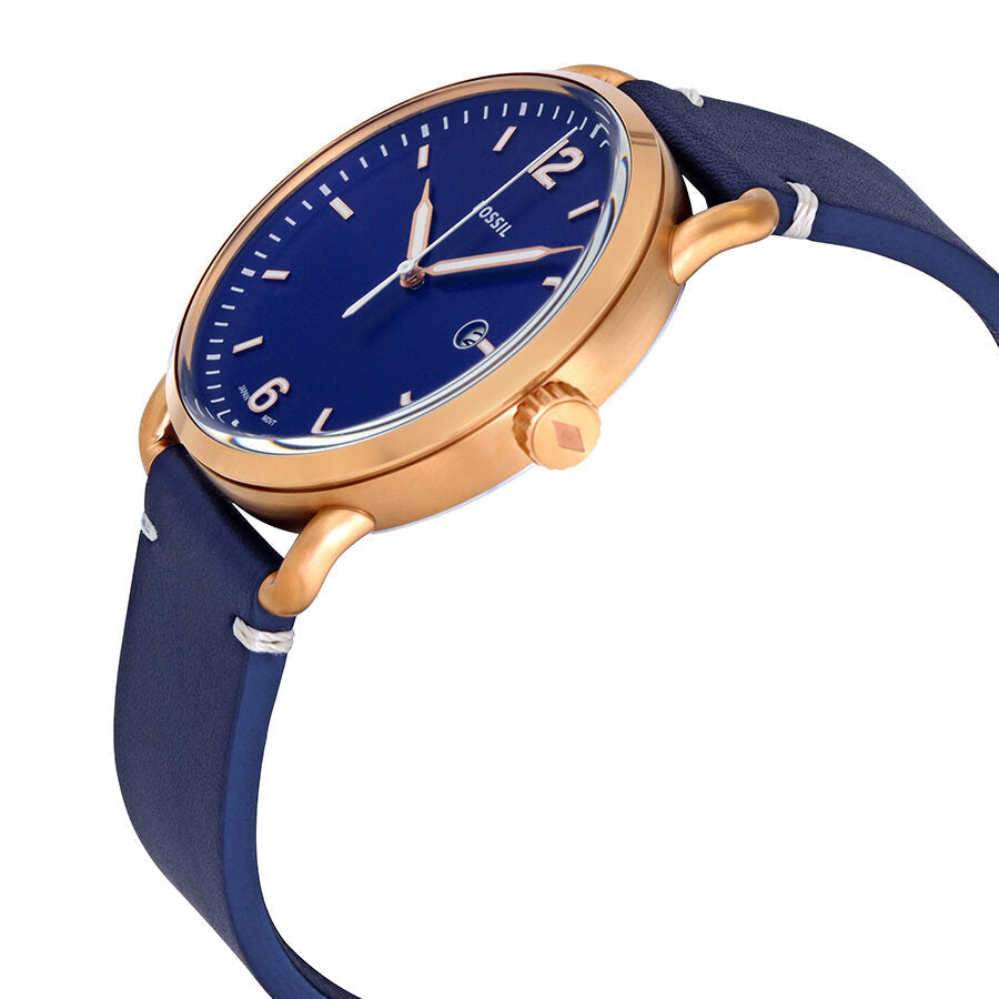 Fossil Commuter watch angled side view showing blue dial and navy leather strap