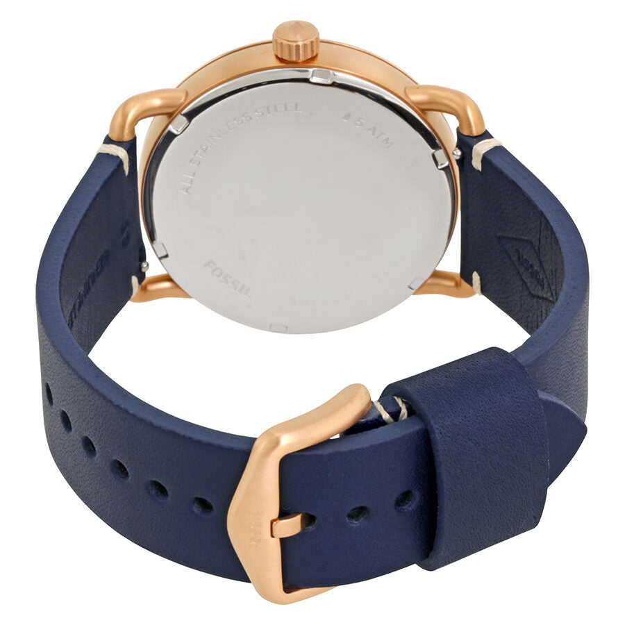 Fossil Commuter caseback view displaying navy leather strap with rose gold buckle