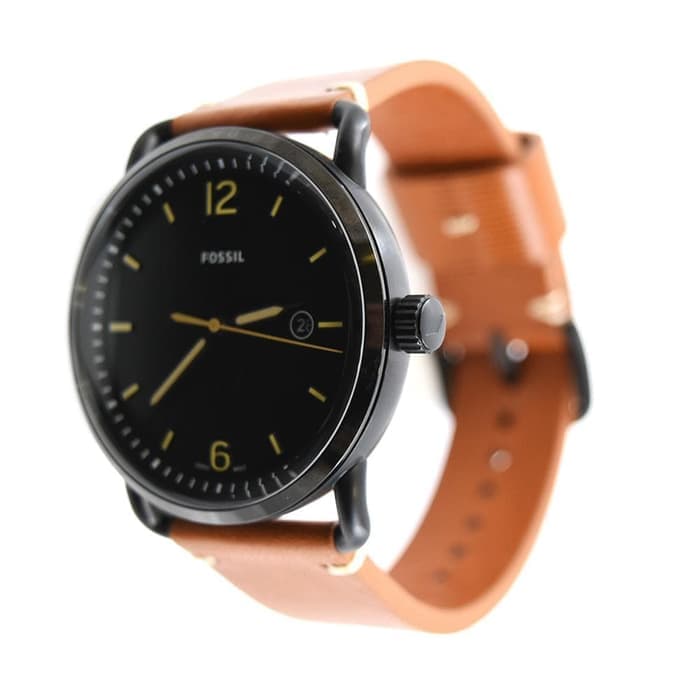 Fossil Commuter watch from side view displaying black case and tan brown leather strap