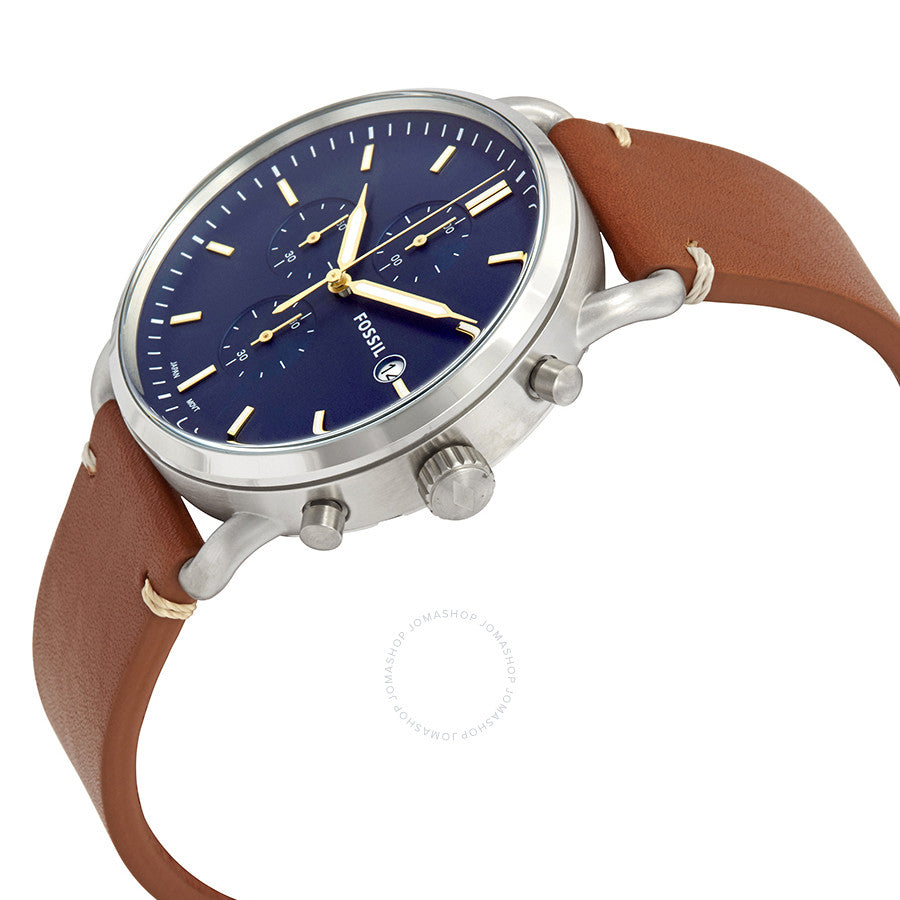 Fossil Commuter chronograph watch shown at angle with blue dial and brown leather strap