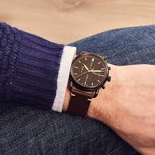 Fossil Commuter FS5403 chronograph watch worn on wrist showing black dial