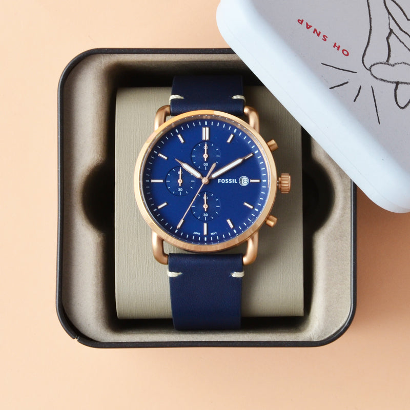 Fossil Commuter FS5404 watch displayed in branded retail box with accessories