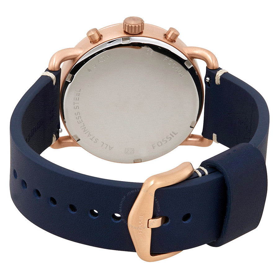 Fossil Commuter FS5404 caseback showing metal case back with rose gold finish