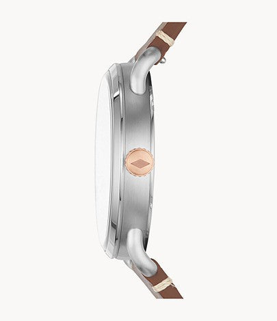 Side profile of Fossil Commuter watch showing case thickness and light brown leather strap
