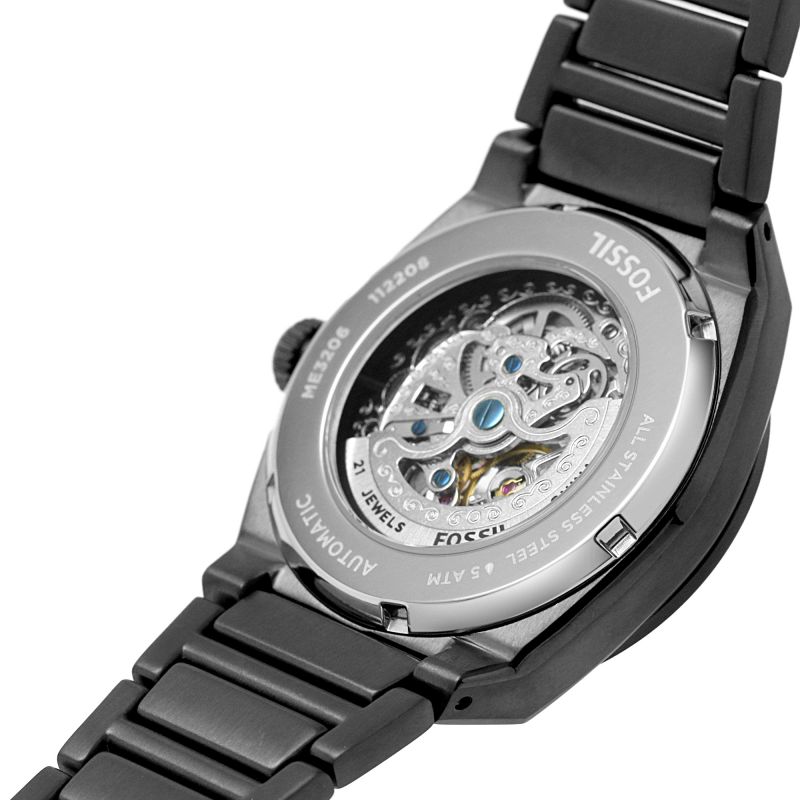 Fossil Everett smoke watch caseback showing automatic movement