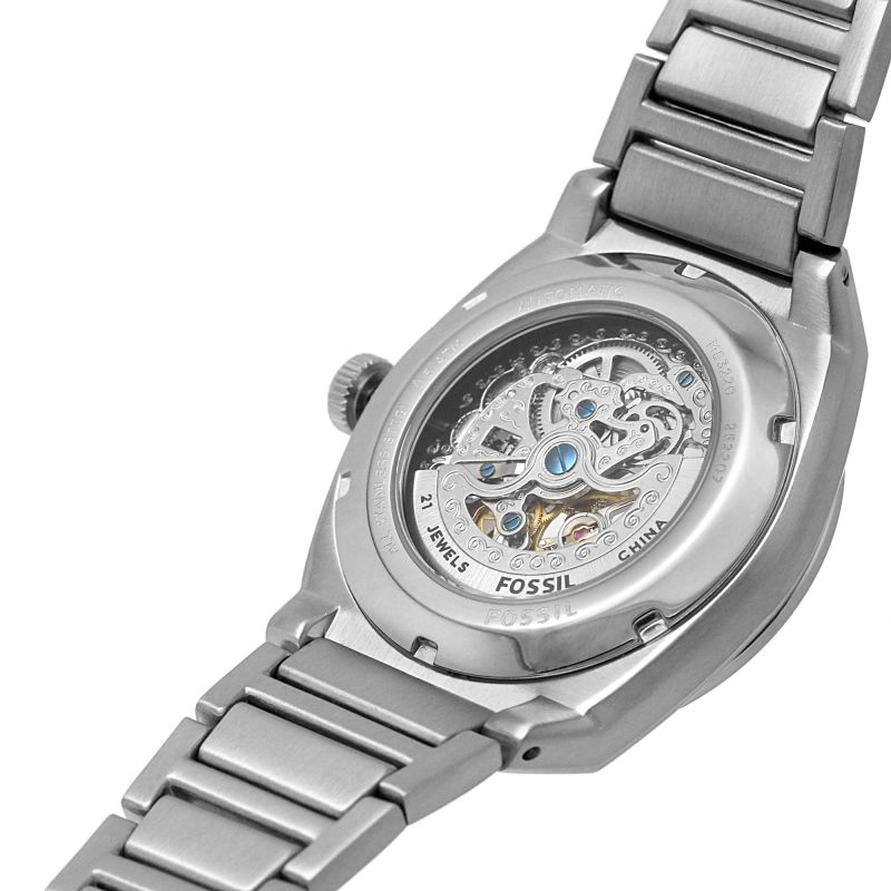Fossil Everett caseback showing automatic movement and skeleton display through transparent case back