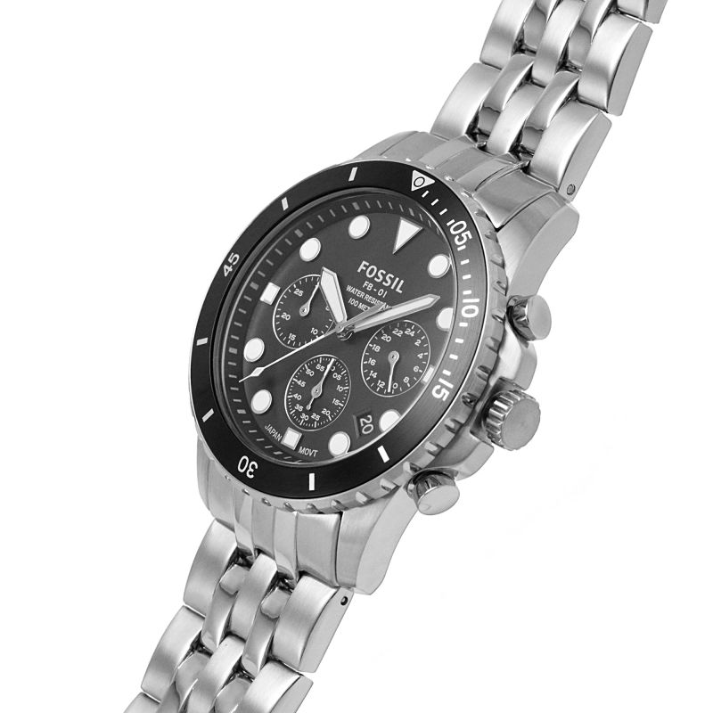 Fossil FB-01 watch at angle showing black bezel, chronograph subdials, and stainless steel bracelet