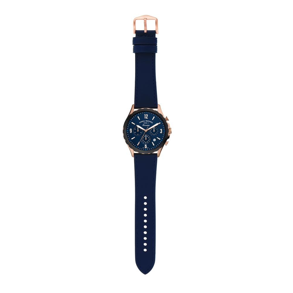 Fossil Forrester chronograph watch on wrist with navy leather strap and rose gold buckle