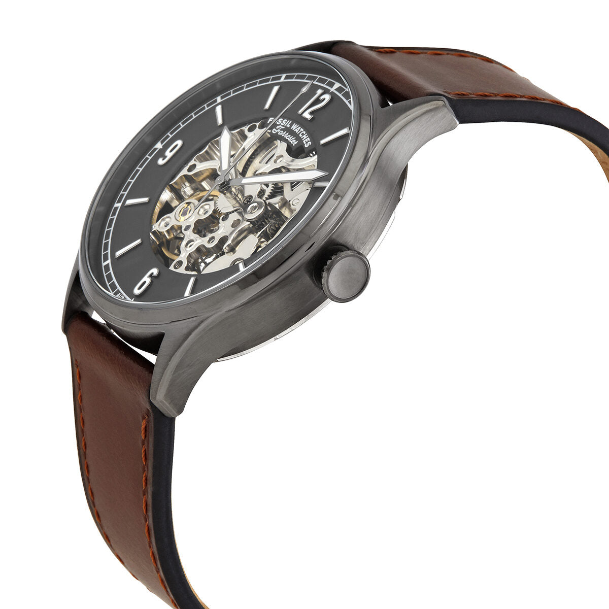 Fossil Forrester automatic watch side view showing grey case, skeleton dial, and brown leather strap