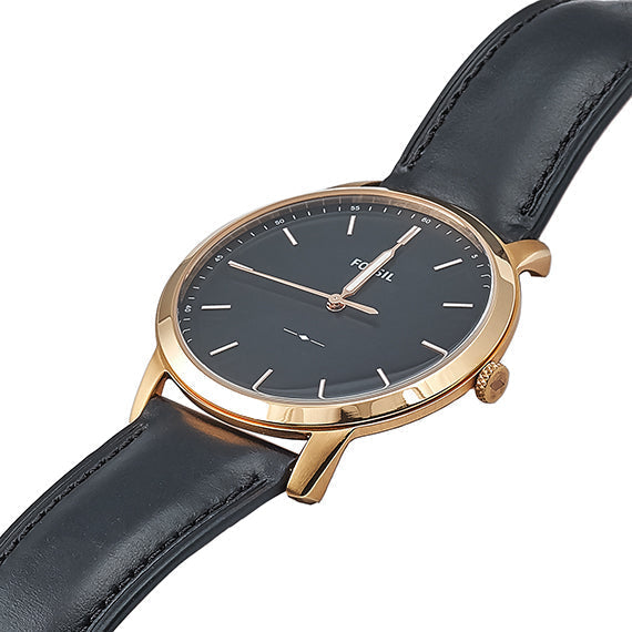 Fossil The Minimalist FS5376 watch worn on wrist with black leather strap