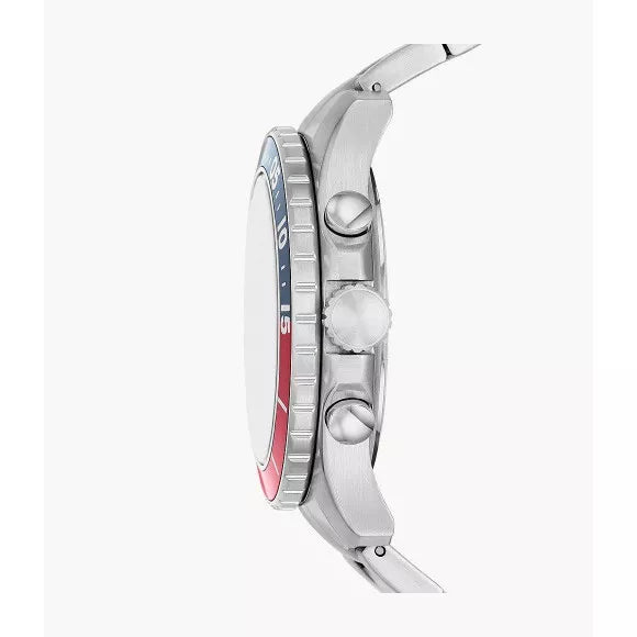 Side angle view of Fossil FS5767 watch showing stainless steel case and blue-red bezel design