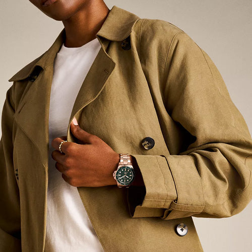 Fossil Gabby ES5371 gold-tone watch on wrist with green dial