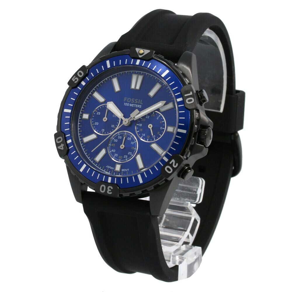 Fossil Garrett Chronograph watch shown at angle with blue dial and black silicone band