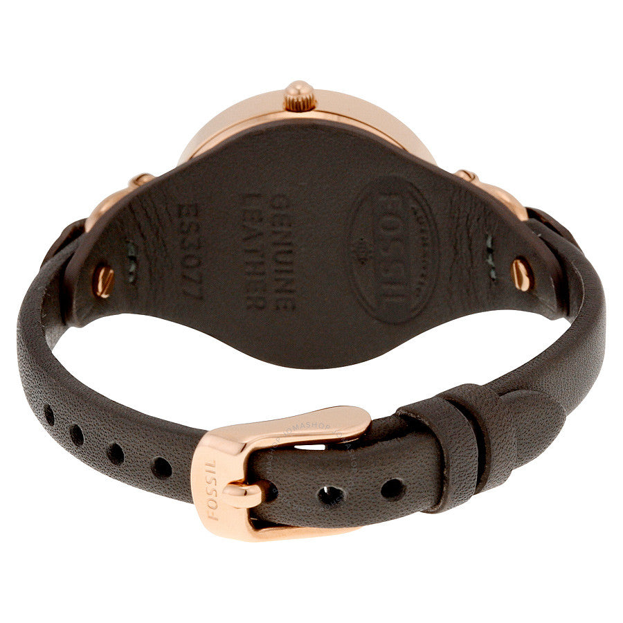 Caseback of Fossil Georgia watch showing black leather strap with studs and rose gold buckle