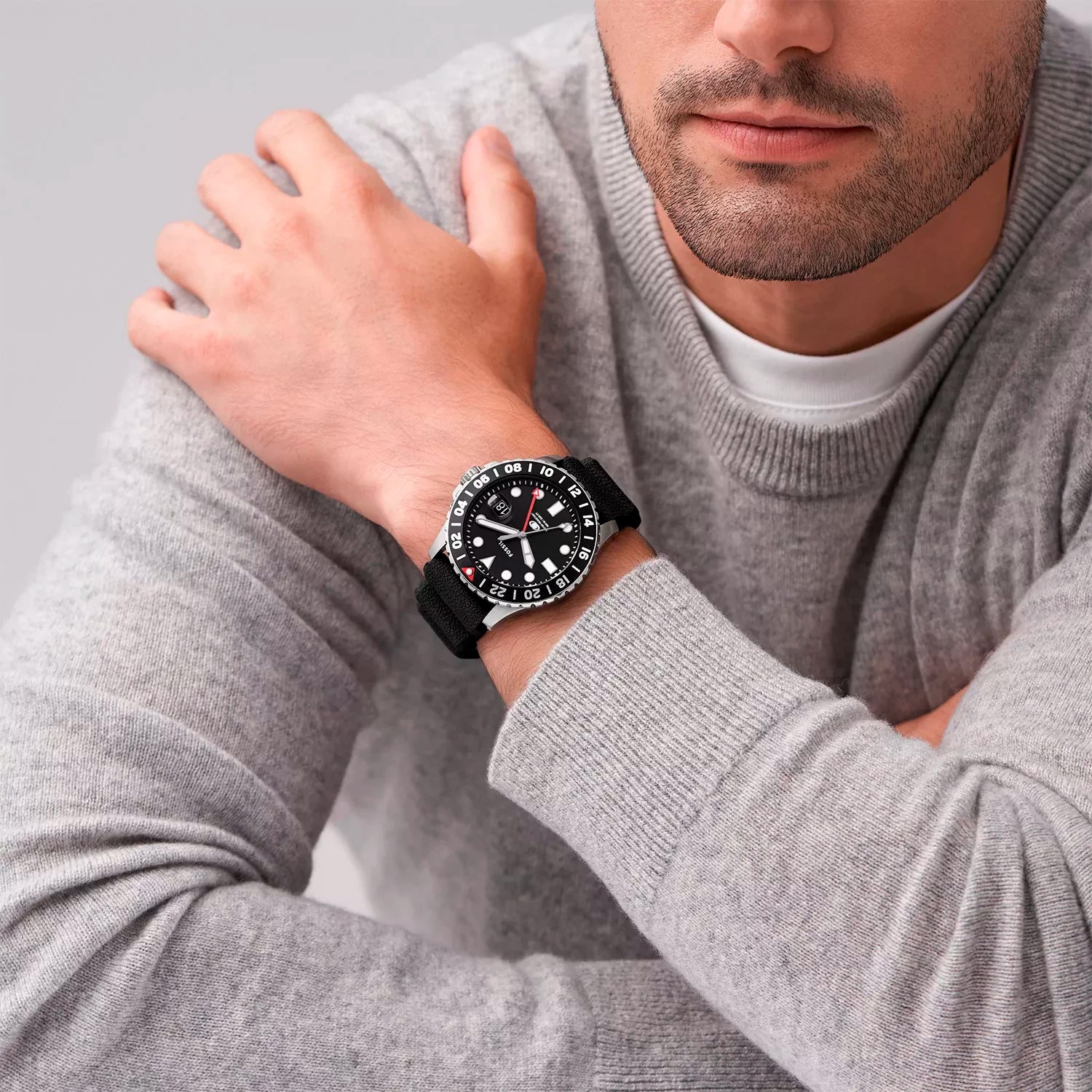 Fossil GMT watch FS6036 on-wrist view with black dial and black leather strap