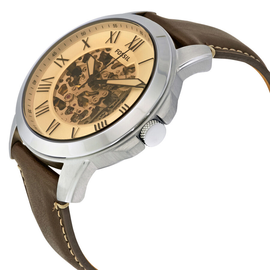 Fossil Grant automatic watch angled view showing cream skeleton dial and brown leather strap