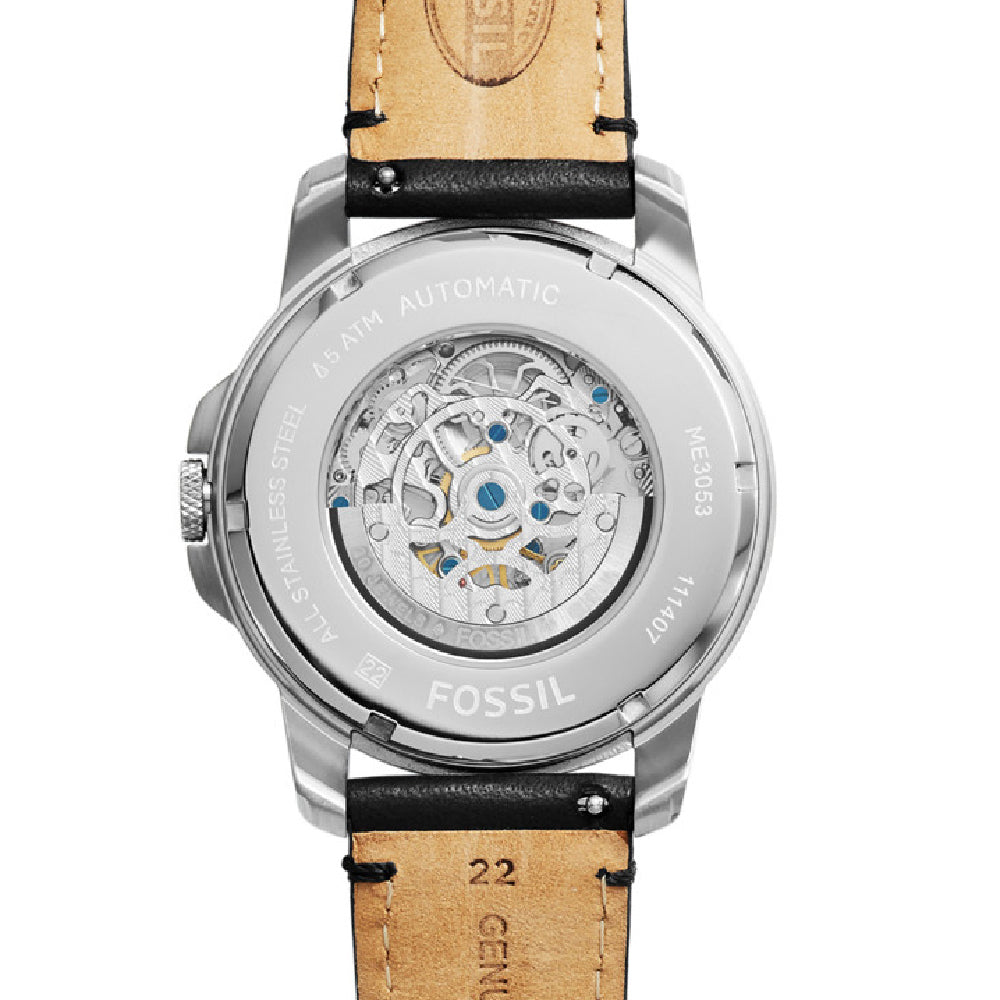 Fossil Grant watch caseback showing automatic movement mechanism with visible gears and components