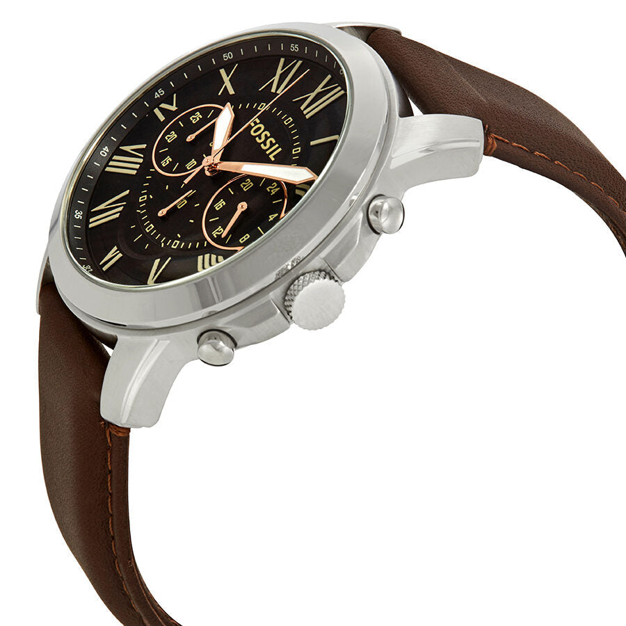 Fossil Grant watch at angle showing silver case, chronograph subdials, and brown leather strap