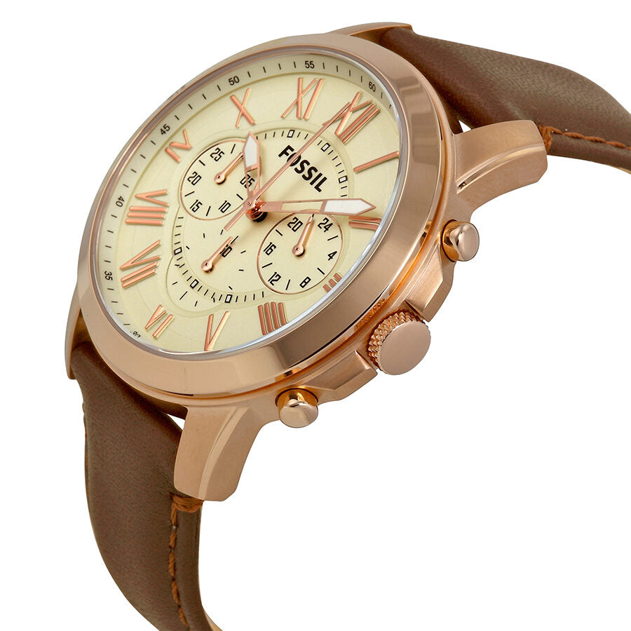 Angled side view of Fossil Grant Chronograph showing rose gold case, chronograph subdials and brown leather strap