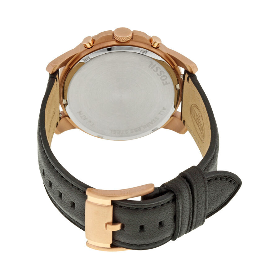 Fossil Grant FS5085 watch caseback showing transparent back with rose gold case and black leather strap