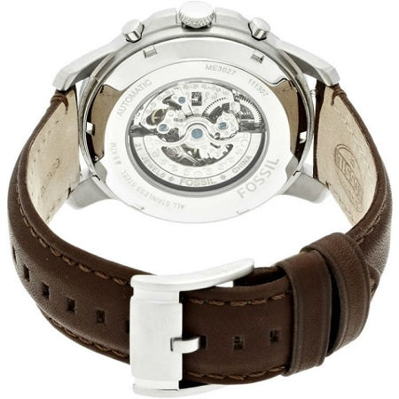 Fossil Grant watch caseback showing visible automatic movement with skeleton window and brown leather strap