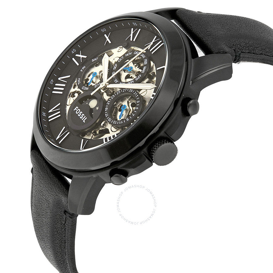 Side angle view of Fossil Grant watch showing black case, skeleton dial, and leather strap