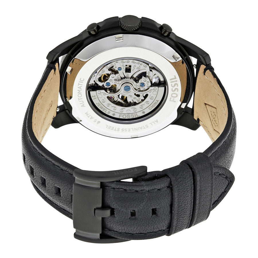 Caseback view of Fossil Grant automatic watch with visible movement and leather strap