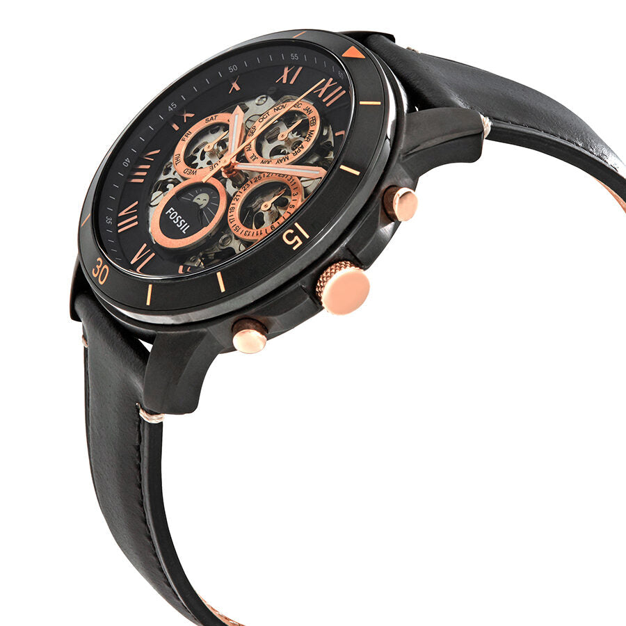 Angled side view of Fossil Grant watch showing case profile and rose gold chronograph pushers