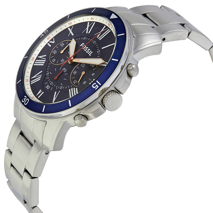 Fossil Grant Sport watch angled side view showing blue bezel and stainless steel case with bracelet